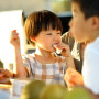 A child eating a pear